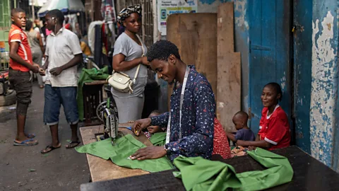 Getty Images Independent tailors are part of everyday life in Nigeria (Credit: Getty Images)