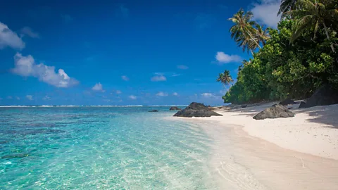 Alamy Ofu Island's lagoon and coral reefs are part of the National Park of American Samoa (Credit: Alamy)