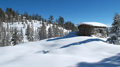 Mike Basich This one-room stone house in the Sierra Nevada mountains was built using local stone, with water from a local creek and electricity from solar panels (Credit: Mike Basich)