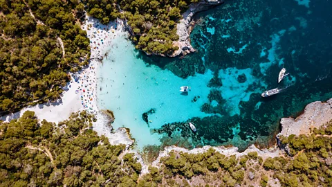Getty Images Aerial view of Cala Turqueta beach, Menorca
