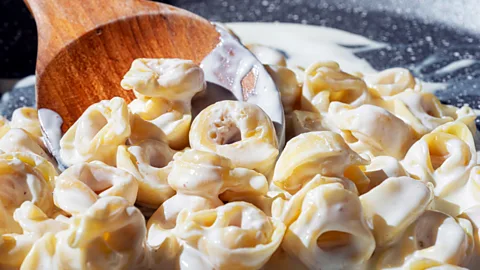 Alamy Emilia-Romagna's biggest claim to fame is its many spectacular food products, including Parmigiano Reggiano cheese, Parma ham and tortellini (Credit: Alamy)