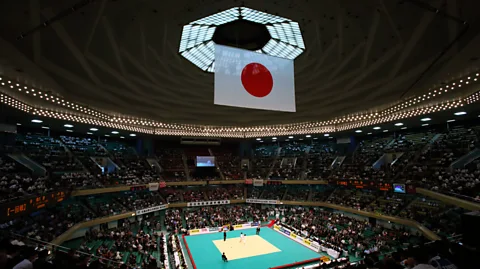 Alamy Originally a martial arts hall, Nippon Budokan has hosted some of the world's most celebrated musical acts, from the Beatles to YOASOBI (Credit: Alamy)