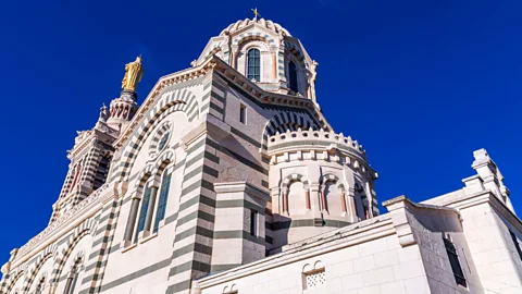 Alamy Marseille's Notre Dame de la Garde basilica can be seen from nearly any corner of the city, including the Bompard; Mazzia's favourite evening stroll (Credit: Alamy)