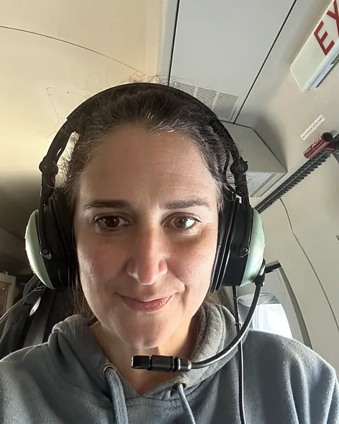 Anna Wilson Anna Wilson onboard the Noaa aircraft (Credit: Anna Wilson)