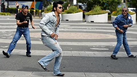 Alamy In Yoyogi Park, Japan, fans of Elvis don their best Elvis dress and emulate their best Elvis dance moves, like the hip swivel (Credit: Alamy)