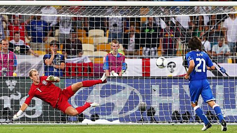 Italy's Andrea Pirlo scores a decisive penalty against England goalkeeper Joe Hart in their quarter-final match at Euro 2012