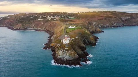 Getty Images Jutting into the sea in north Dublin Bay, Howth Head is is an area of wild natural beauty (Credit: Getty Images)