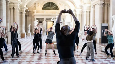 The Louvre Between jogging, yoga and a disco dance workout, athletes in the Louvre did hip rotations (Credit: The Louvre)