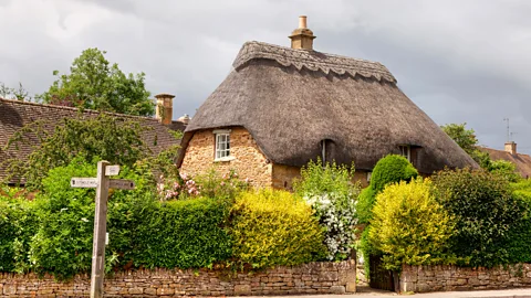 Alamy The honey-coloured Cotswold cottages and farmhouses are particularly sought-after by newcomers (Credit: Alamy)