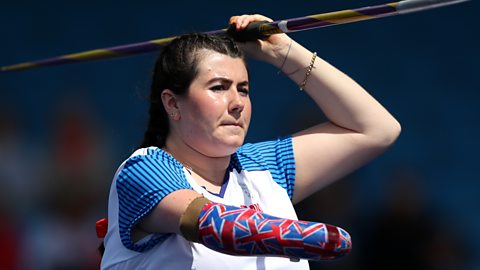 Hollie Arnold throwing a javelin at the Paralympics