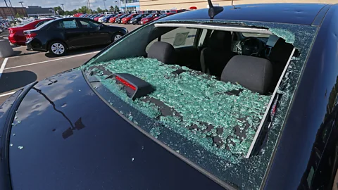 Getty Images A rear window shattered by hail in a severe storm (Credit: Getty Images)