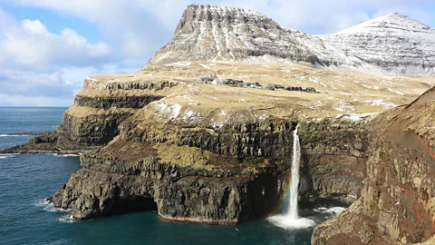 Mike MacEacheran Múlafossur waterfall is one of the biggest tourist attractions on the Faroe Islands (Credit: Mike MacEacheran)