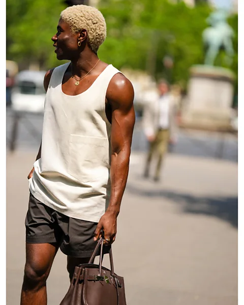 Getty Images A guest at Paris Fashion Week favours the short-shorts look (Credit: Getty Images)