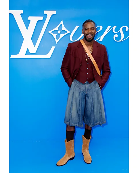 Getty Images Actor Colman Domingo recently sported long denim shorts to the Louis Vuitton spring/ summer 2025 menswear show in Paris (Credit: Getty Images)