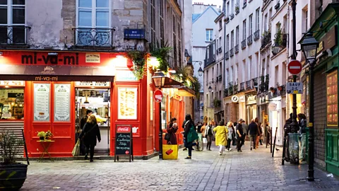 Alamy Le Marais is a shoppers' paradise, from vintage clothes to gourmet treats (Credit: Alamy)