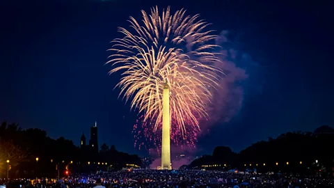 Getty Images Independence Day fireworks explode behind the Washington Monument in Washington DC (Credit: Getty Images)