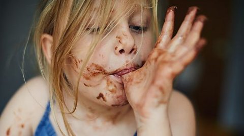 Girl eating chocolate