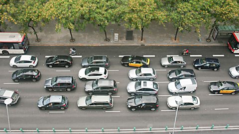 View from a window overlooking traffic in Mexico City