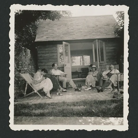 Houghton Library, Harvard University Angelica Garnett, Vanessa Bell, Clive Bell, Virginia Woolf and John Maynard Keynes pictured at the sanctuary of Monk's House in 1935 (Credit: Houghton Library, Harvard University)