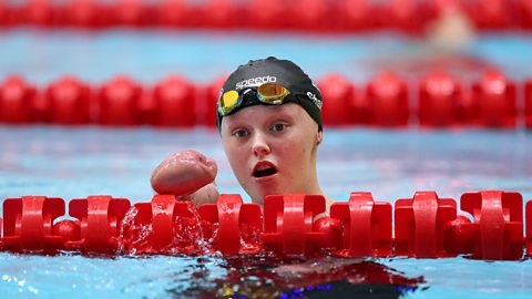 Ellie Challis in swimming pool at competition