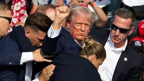 Getty Images A number of conspiracy theories began spreading in the confusion and disbelief that followed the attempted assassination of former President Donald Trump (Credit: Getty Images)