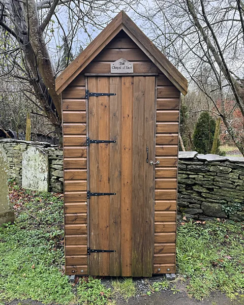 Sarah Baxter Dorstone's "Chapel of Ease" is a portaloo in the graveyard (Credit: Sarah Baxter)