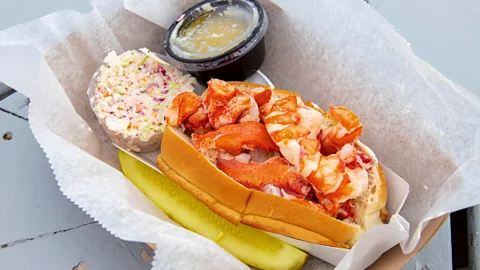 Alamy McLoons Lobster Shack on Spruce Head Island serves two kinds of lobster rolls so you can see which one is your favourite (Credit: Alamy)