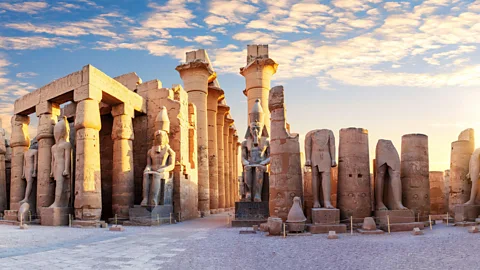 Alamy Ancient stone pillars and statues in Egypt (Credit: Alamy)