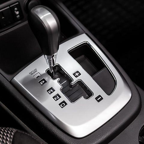 Close-up view of an automatic car gearbox, article for learning to drive