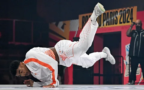 Getty Images The lower a competitor's centre of mass is to the floor, the easier it is to hold freeze moves (Credit: Getty Images)