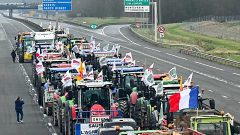 Getty Images French farmers have taken to the highways over concerns about tax, pay and regulation (Credit: Getty Images)