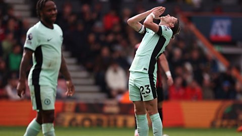 Chelsea's Conor Gallagher looks to the sky in disappointment after missing a shot on goal during the match against AFC Bournemouth. Raheem Sterling walks by.