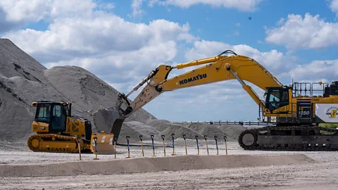 Getty Images A digger breaks new ground on the EAA reservoir in January 2024 as work continues to build one of the largest environmental restoration projects in the world (Credit: Getty Images)