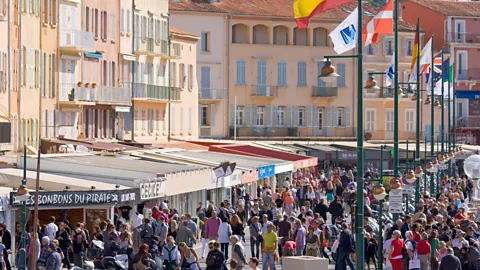 Alamy In the summer, more than 80,000 visitors a day flood into tiny St-Tropez (Credit: Alamy)