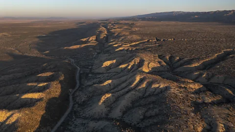 Getty Images The San Andreas fault between the Pacific and North American tectonic plates is clearly visible from the air in places (Credit: Getty Images)