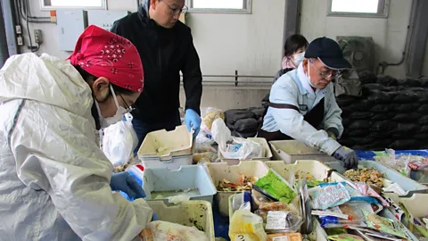Rachel Nuwer The food is sorted by hand when it arrives at the processing facility – and it receives around 40 tonnes per day (Credit: Rachel Nuwer)