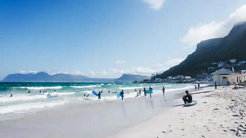 Pier Nirandara Muizenberg Beach with its gentle swells is one of Foster's top recs for a sublime surfing experience off Cape Town's coast (Credit: Pier Nirandara)