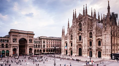 Getty Images The Gothic marvel Duomo di Milano is one of Milan's iconic sights, and a perennial favourite meeting place for locals and visitors alike (Credit: Getty Images)