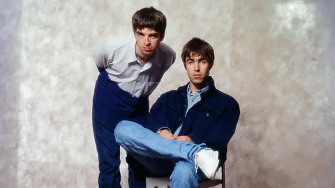 Getty Images The dynamic between the two brothers was what drove Oasis to glory, and eventually into the ground (Credit: Getty Images)