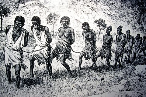 A depiction of of enslaved Africans in chains.