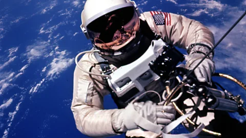 Nasa Astronaut Ed White with the Earth behind him (Credit: Nasa)