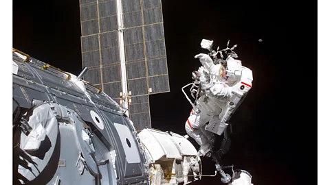 Nasa Astronaut Jerry Ross and his colleague James Newman connected 40 cables between the Zarya control module and the Unity module in 1998 (Credit: Nasa)