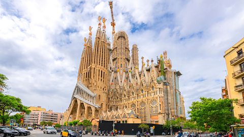 Sagrada Familia cathedral in Barcelona with tower crane above