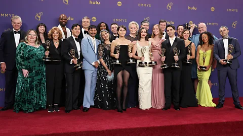 Getty Images The Hacks cast and crew after their win for best comedy (Credit: Getty Images)