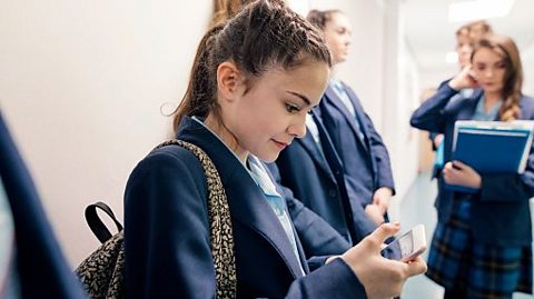 Student uses phone in schcool