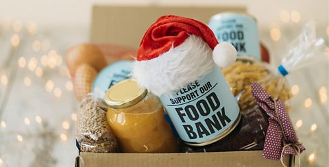 A box of Christmas food bank donations