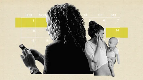 BBC/Getty Images Two women using phones, one holding a baby, with a calendar behind them (Credit: BBC/Getty Images)