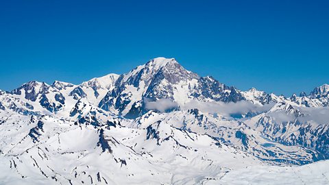 Mont Blanc mountain in the French Alps, a high peak covered in snow