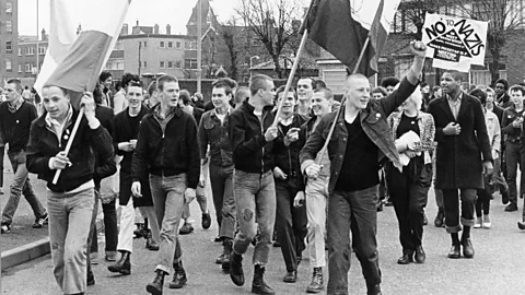 Getty Images An anti-National Front protest in the UK in 1979 – the political turbulence of the time fed into the band's music (Credit: Getty Images)