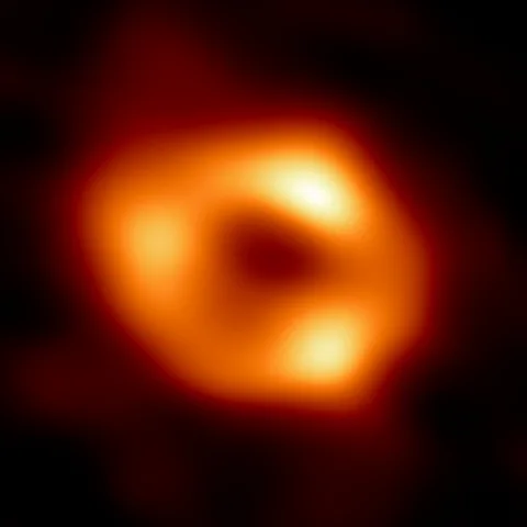 EHT Collaboration The glowing ring of gas orbiting the black hole at the centre of the Milky Way, known as Sagittarius A*, has been imaged by the Event Horizon Telescope (Credit: EHT Collaboration)